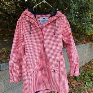 Helly Hansen Raincoat for women. 100% polyester shell and lining